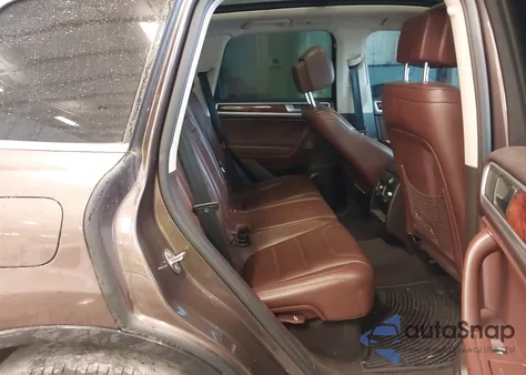 2011 Volkswagen Touareg Vr6 Lux z USA, uszkodzony, nr VIN WVGFF9BP4BD004258